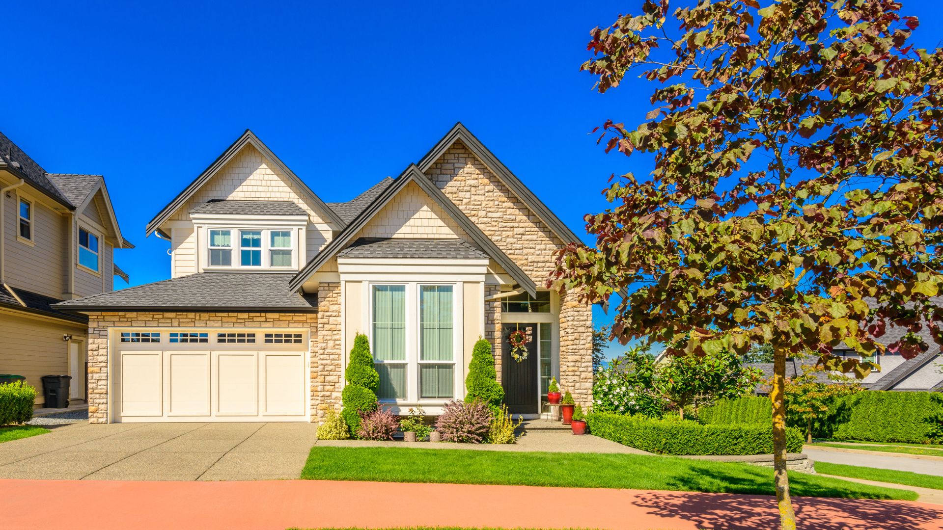Two-story suburban house with a front yard