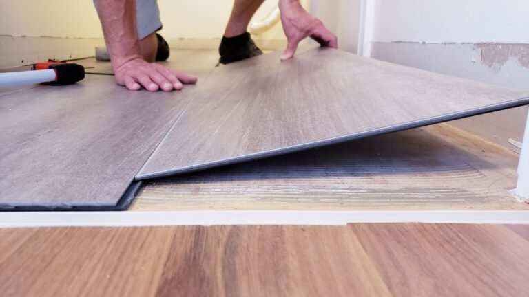 Vinyl plank flooring being installed